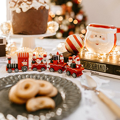christmas cookies and decorations on a table