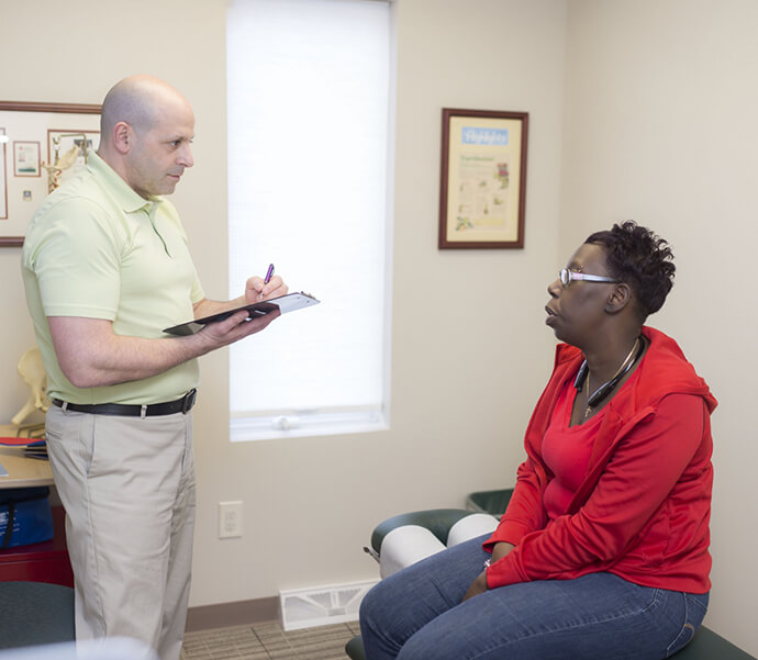 Dr Luper talking to patient