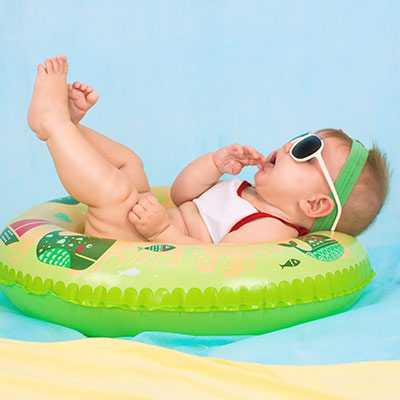 baby floating on a pool floatie
