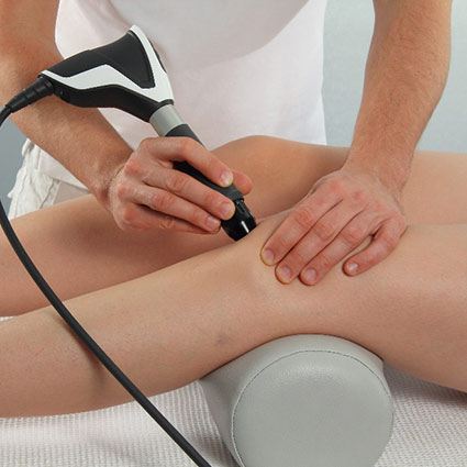 shockwave therapy on a leg