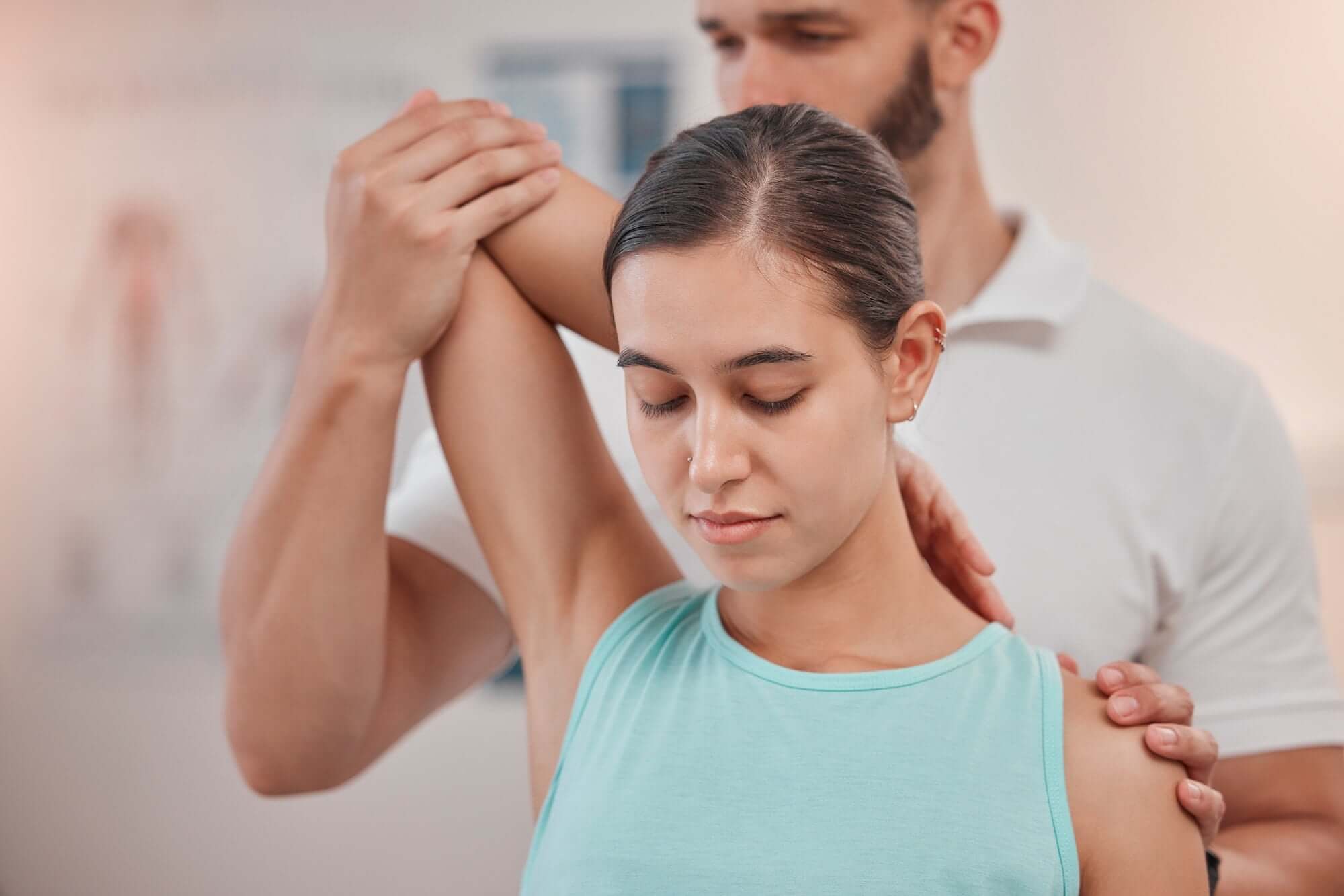 physical-therapy-woman-patient-and-physiotherapy-at-a-spa-or-clinic-for-chiropractic-consultation-