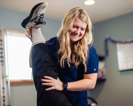 Patient getting his leg stretched