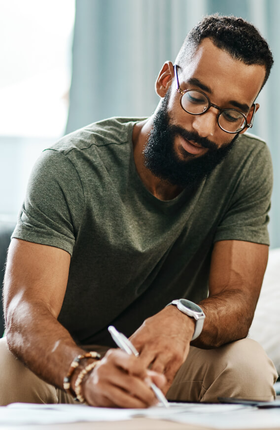 Man filling out paperwork