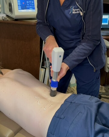Wave therapy used on back