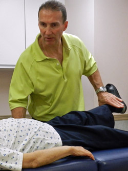 Dr. Weyrauch examining patient