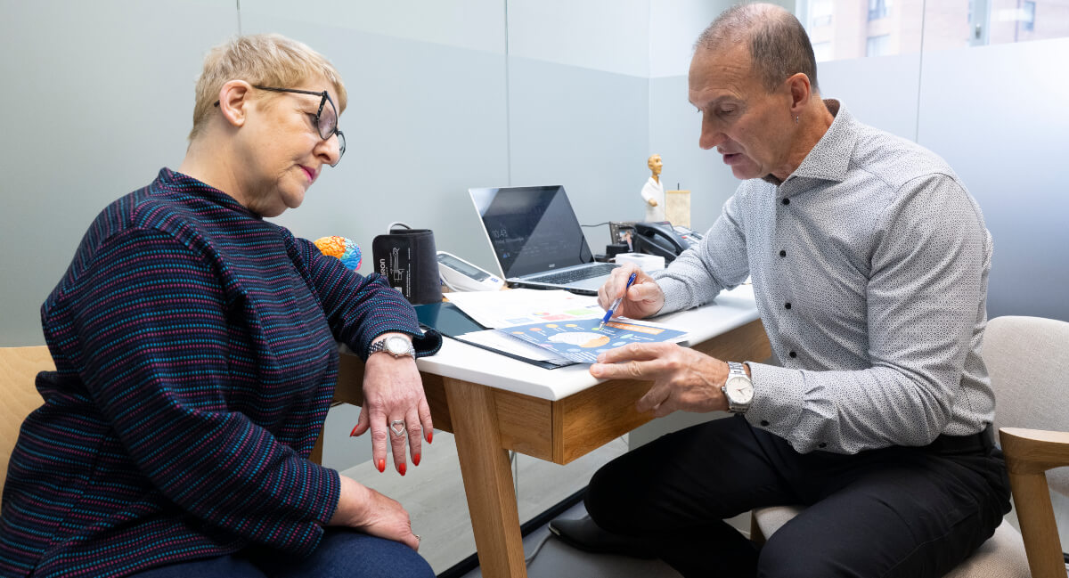 North York chiropractor in a consultation with a patient