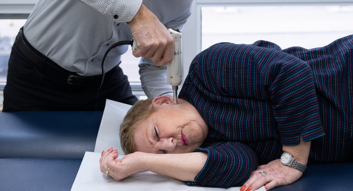 North York chiropractor using activator technique to treat patient