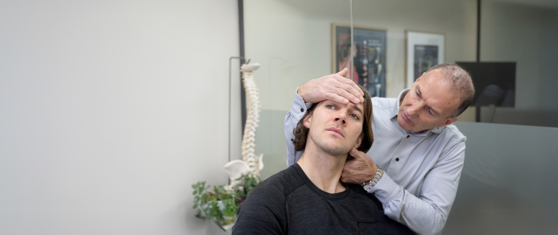 Doctor adjusting patient