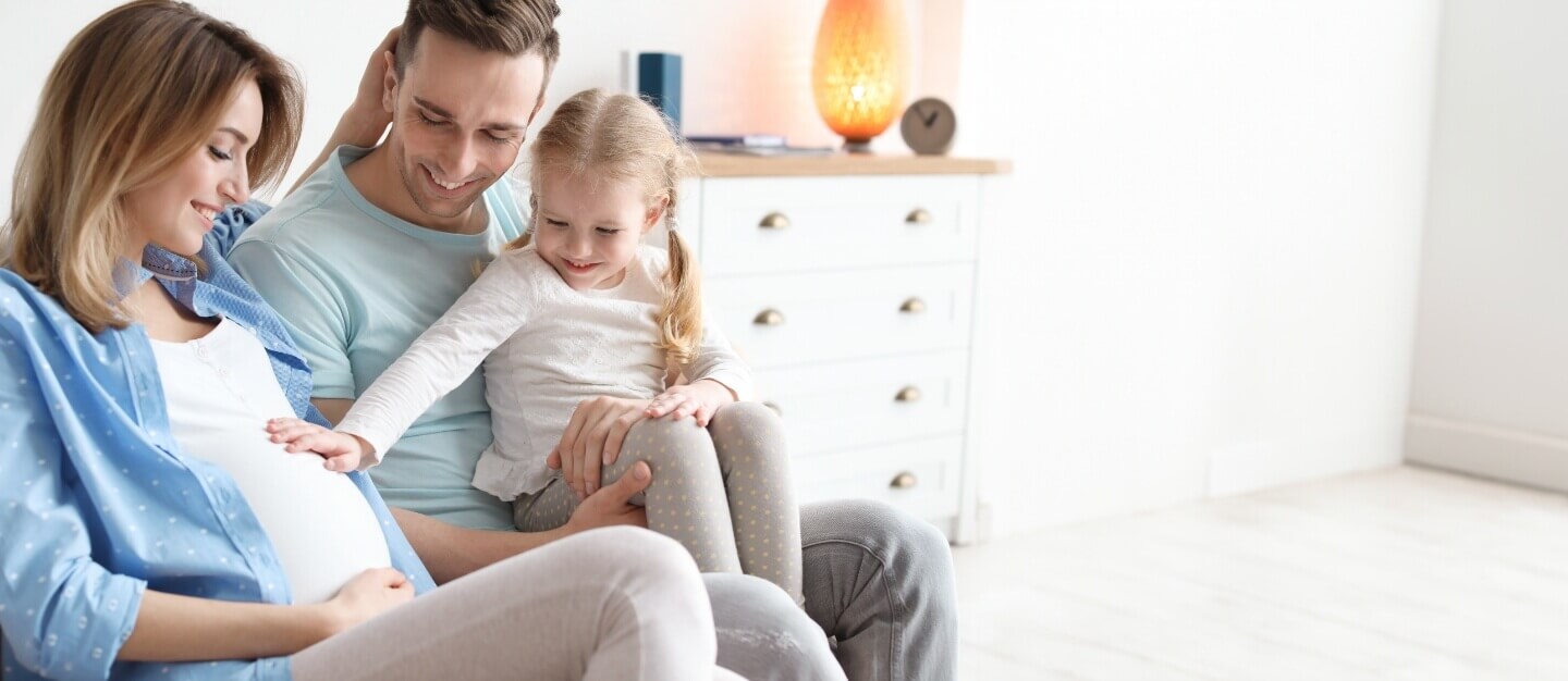 Mom and Dad with young daughter