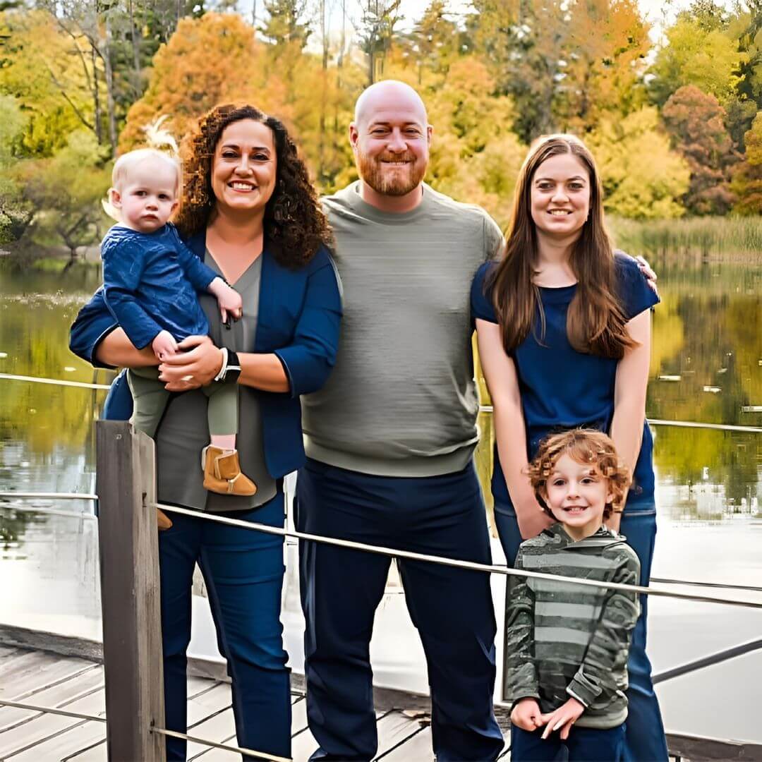 Dr. Holly posing with family