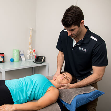 Woman getting neck treatment