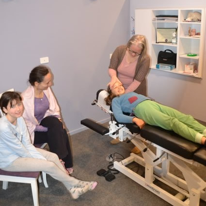 paediatric chiropractor in Canberra working with a child patient