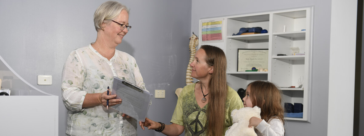 Canberra Patient and child in a chiropractic consultation