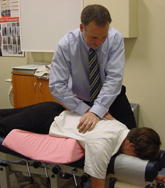 Dr. Simon Parker (Chiropractor) adjusting a patient.