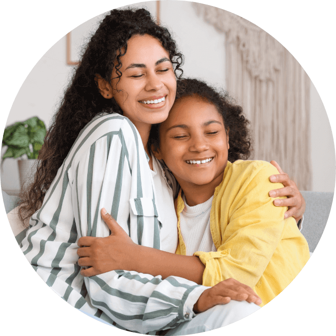 mom and daughter hugging