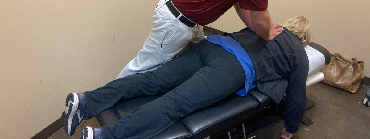 Hoover chiropractor adjusting a female patient