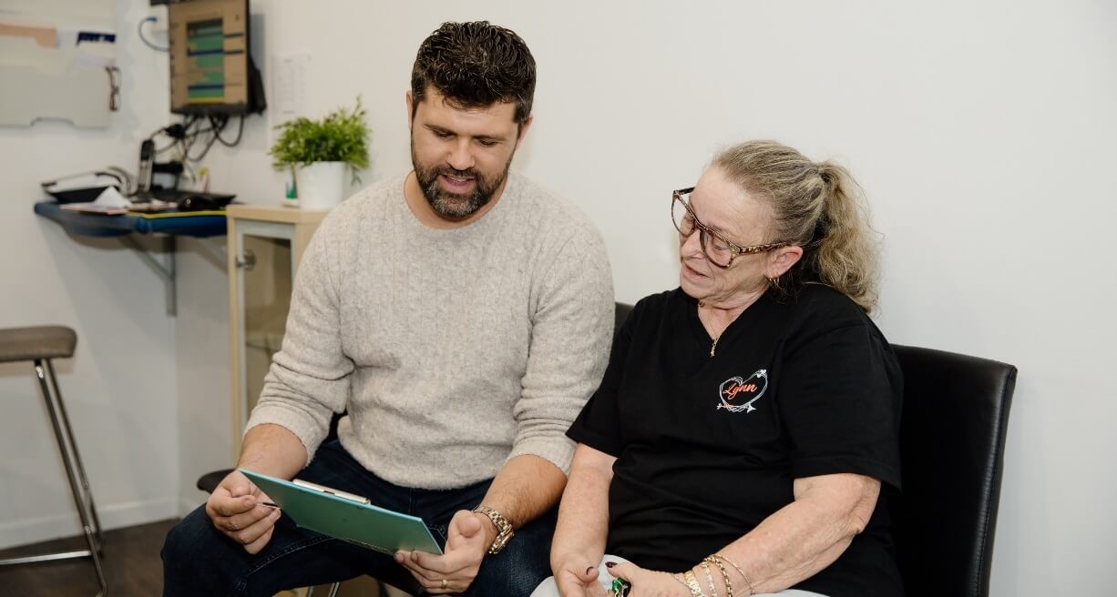 Female patient in discussion with doctor