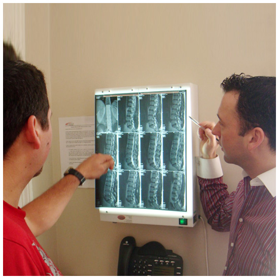 Looking at x-rays with patient