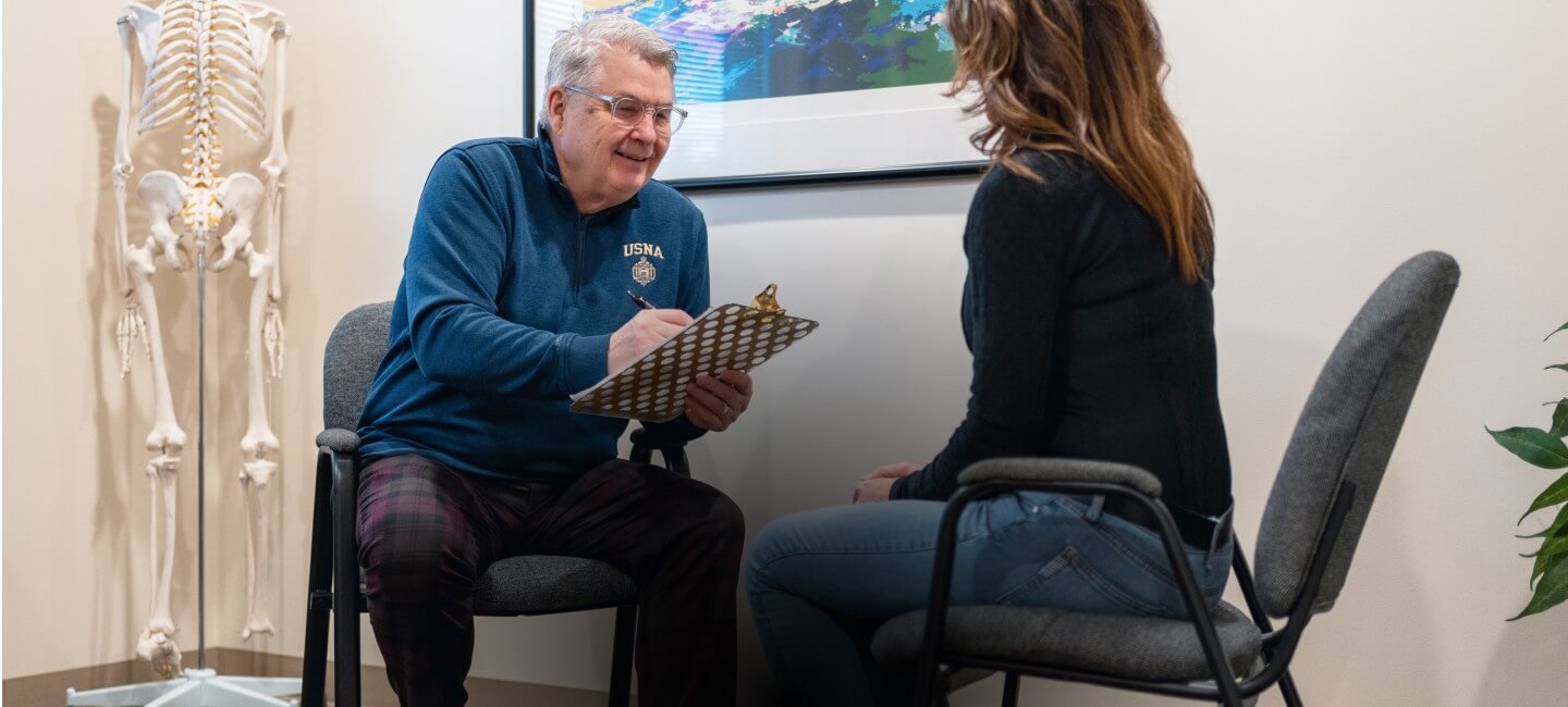 Dr. Rod talking to patient