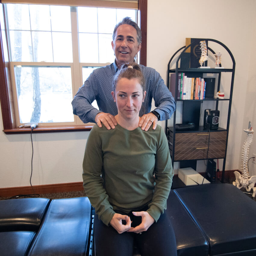 Adjusting patient shoulders