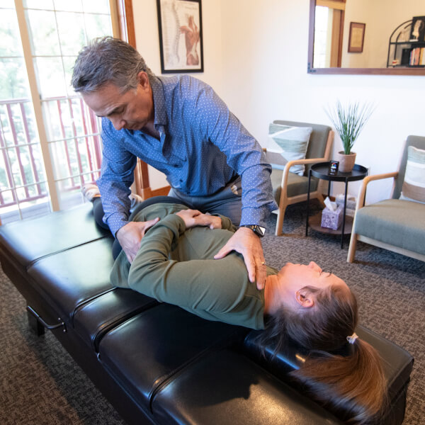 Bend Chiropractor Dr. Tobey adjusting patient