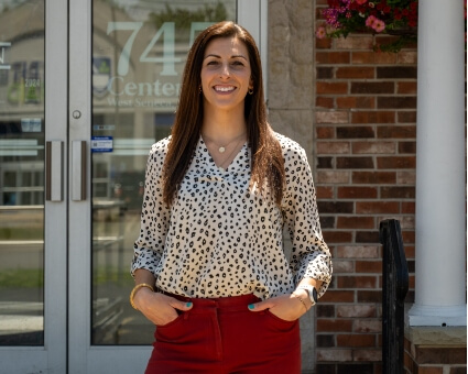 West Seneca chiropractor Dr. Sara standing outside the office