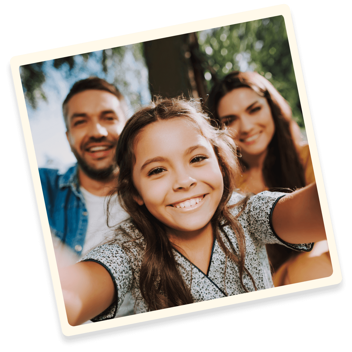 Smiling mom, dad and daughter posing for photo