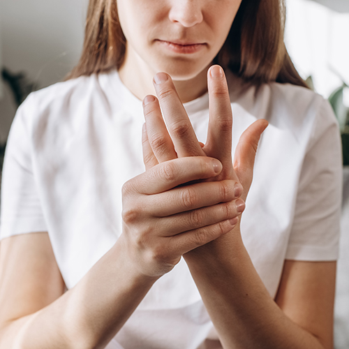 woman finger pain