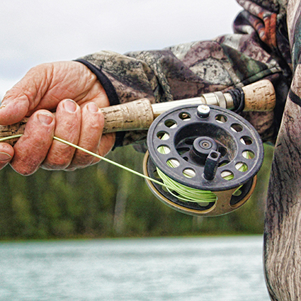 Man-Holding-Fishing-Rod