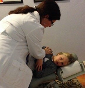 Dr. Janet adjusting Muzette.