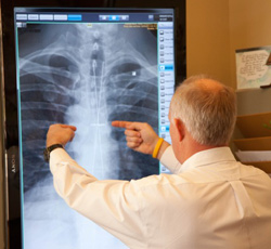 Dr. Don examining an xray