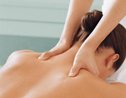 Massage Therapist massaging patient's neck