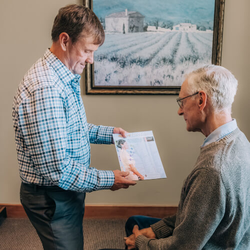 Patient in chiropractic consultation