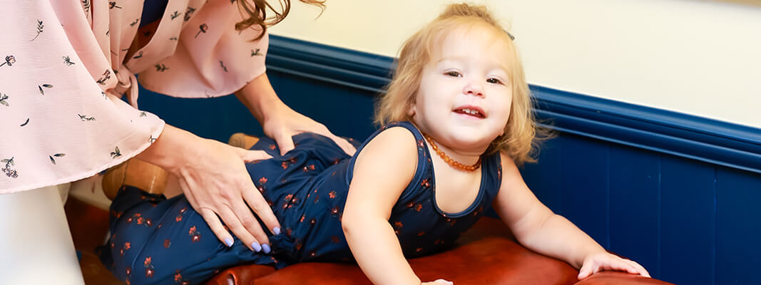 Virginia Beach chiropractor adjusting a little girl's back