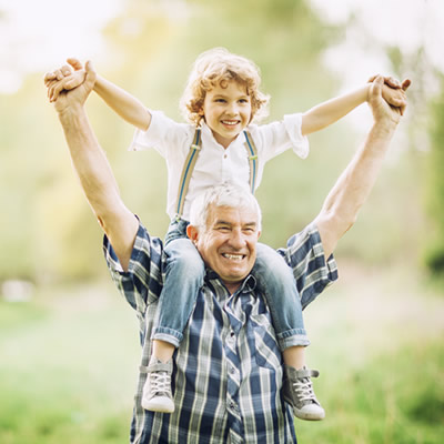 grandpa and child on shoulders