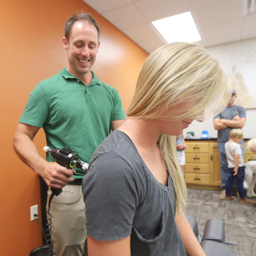 Chiropractic FIRST patient having back adjusted