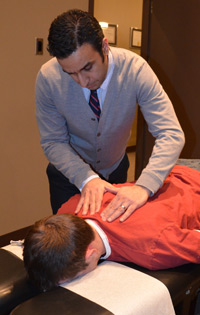Dr Sony Canteenwala assessing the spine.