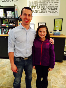 David Hanson with a young patient