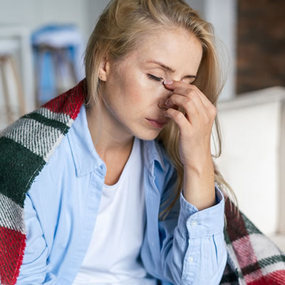 woman feeling sick