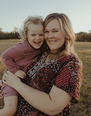 Dr. Robart and her daughter smiling