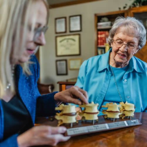 Fresno chiropractor in discussion with a patient