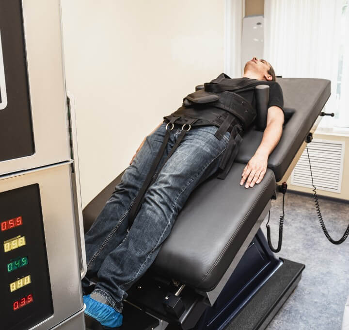 patient on spinal decompression table
