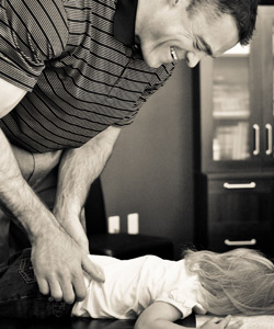 Dr. Jared Morrow adjusting a child.