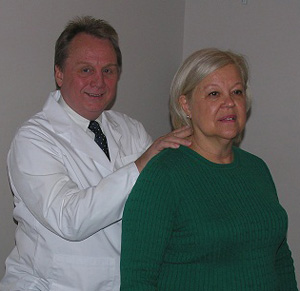 Dr. W. Gregory Capps adjusting neck