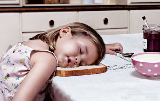 Girl-Kid-Sleeping-On-Bread-Funny-Awkward-Position