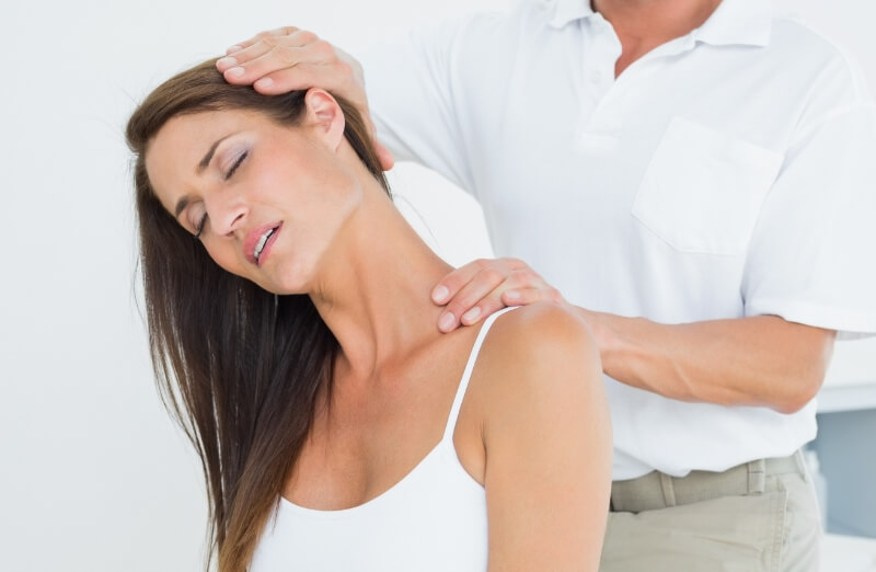 woman having their neck adjusted
