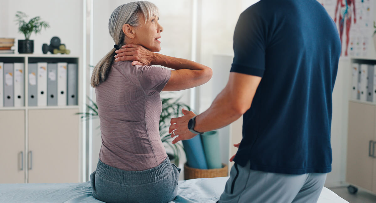 Female patient in chiropractic consultation