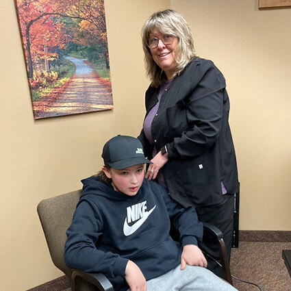 Laser therapy treatment on boy