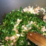 Adding Spinach to the meat and spices mixture