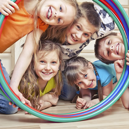 A Group of Children Head in Hoops Showcasing Chiropractic Care for Kids in Boston, MA